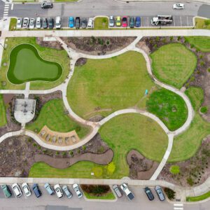 An aerial shot looking down on a green space at a living facility.