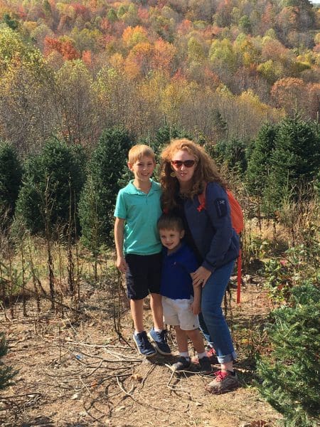 A mom and her kids in a forest