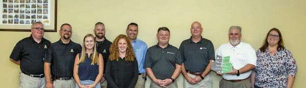 Members of WithersRavenel's local government and funding teams present a plaque to the Public Administration Program at Appalachian State University