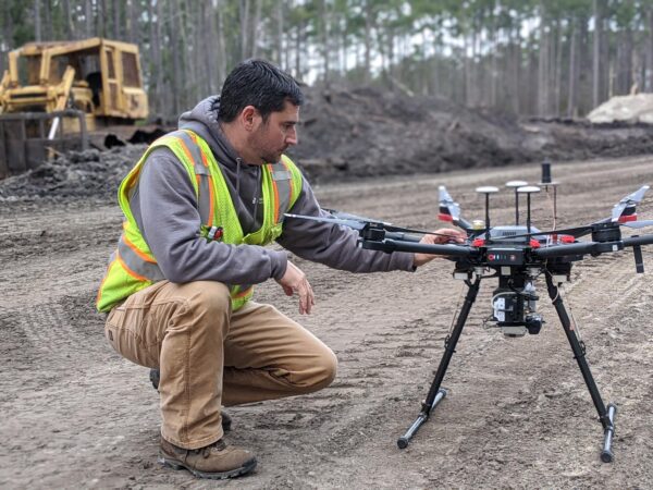 a worker preparing a drone