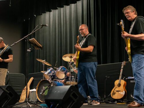a band performing on stage