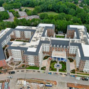 An aerial shot looking down on a recently constructed living facility.