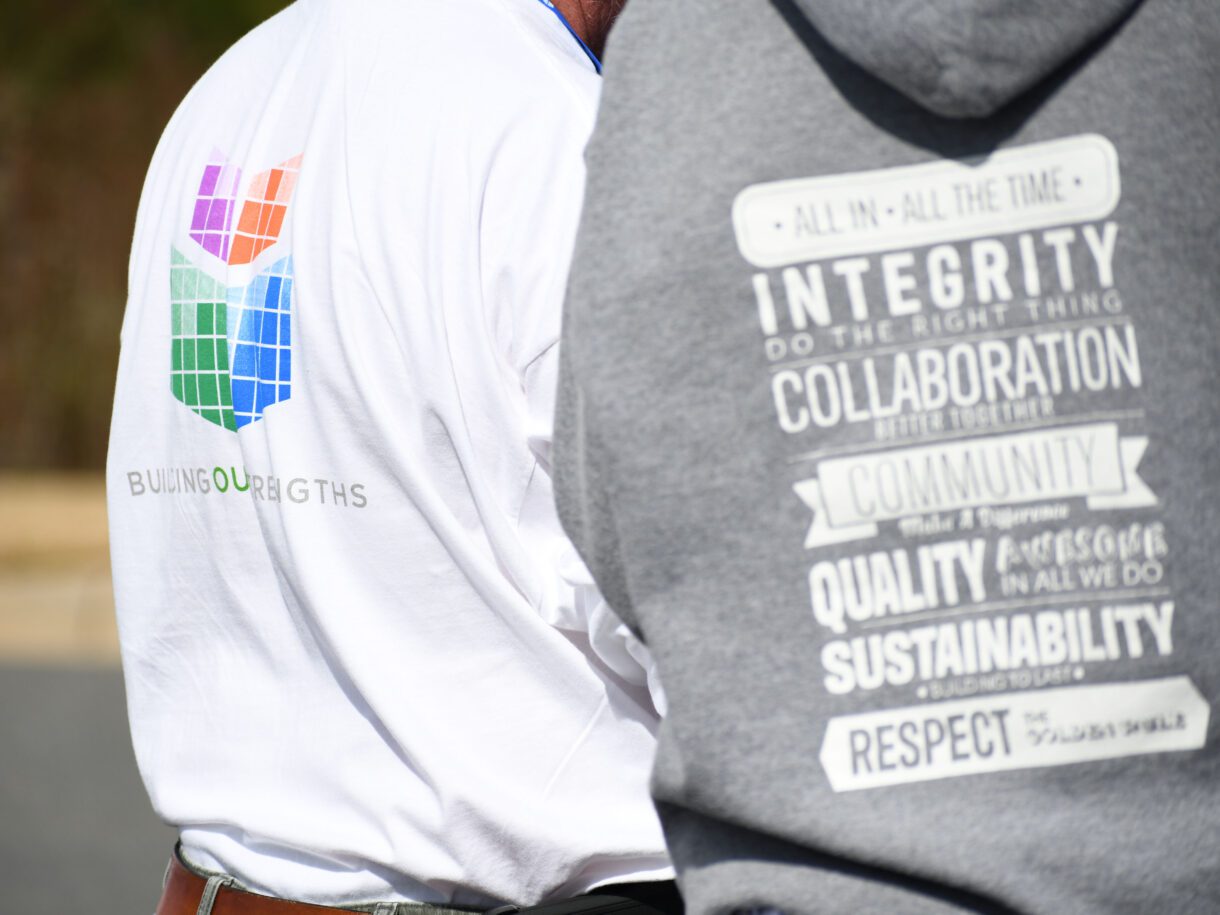 Close-up of a sweatshirt showing the company's core values