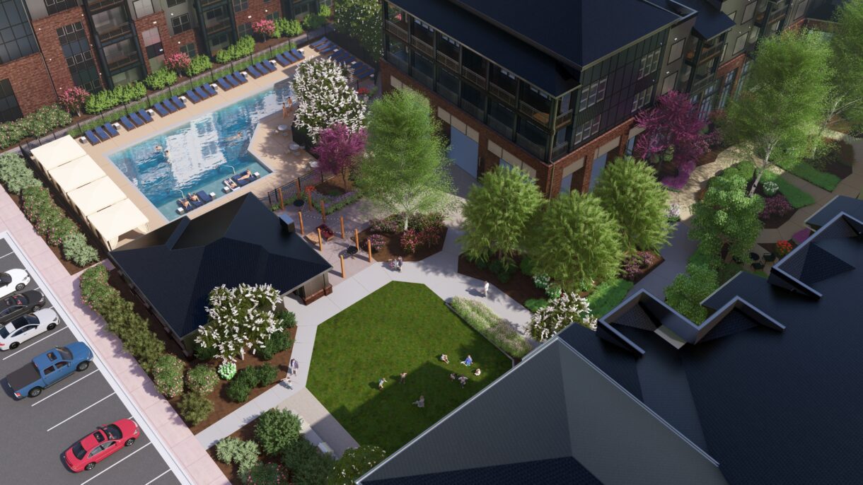 A 3d rendering of townhomes and landscaped courtyard