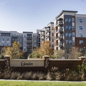 Photos from a sidewalk looking up at residential buildings in Cary, North Carolina.