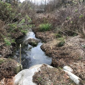 A damaged stormwater drain following a hurricane.