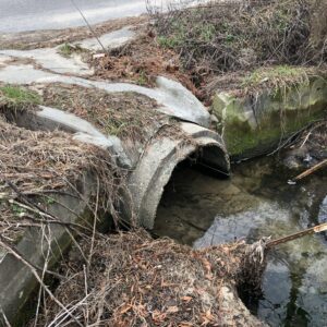 A damaged stormwater drain following a hurricane.