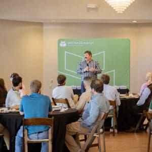 Company leader speaks at professional event