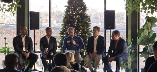 Speakers and moderator at Charlotte land developer panel discussion