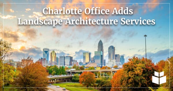 An image of the Charlotte, North Carolina skyline with the text "Charlotte Office Adds Landscape Architecture Services."