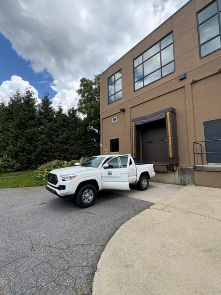 A WithersRavenel truck in front of an office building in Asheville, North Carolina.