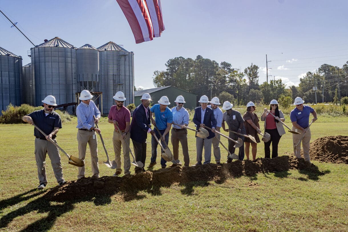 People digging into the ground for the groundbreaking at Madison Street Park in Whiteville.