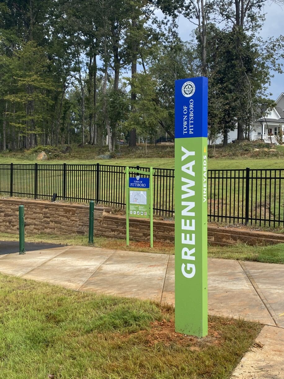 A wayfinding sign on the Vineyards Greenway at Chatham Park.