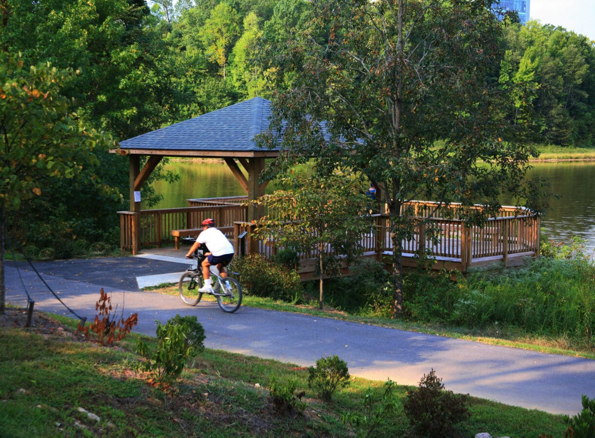 A rendering of a biker on the Black Creek Greenway.