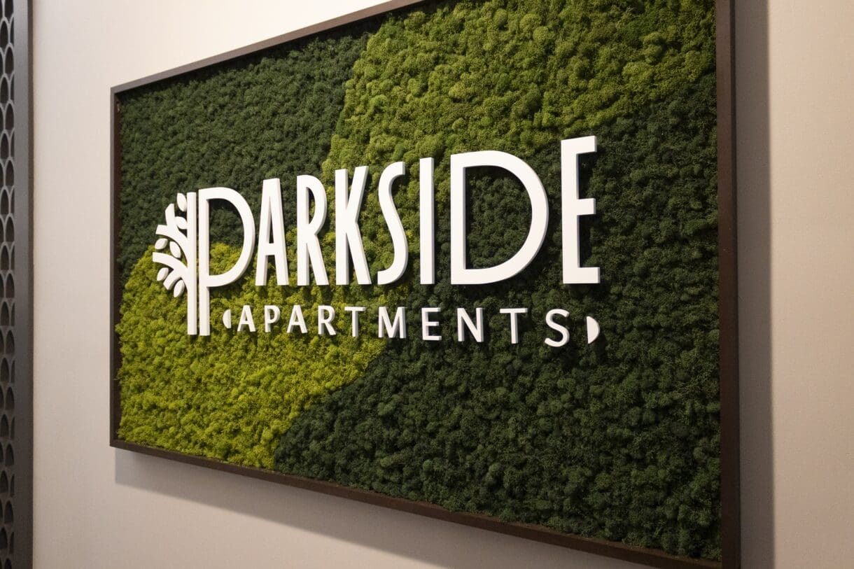 A sign that says "Parkside Apartments."
